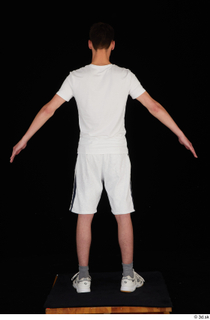  Johnny Reed dressed grey shorts sneakers sports standing white t shirt whole body 0013.jpg